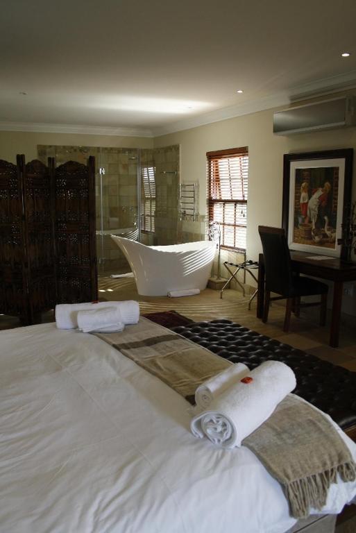 Afrique Boutique Ruimsig Hotel Roodepoort Quarto foto